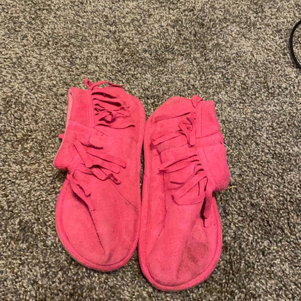 Little girls pink slip on moccasins